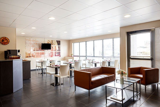Salle de petit-déjeuner - Séjours & Affaires Paris Vincennes Salle de petit-déjeuner