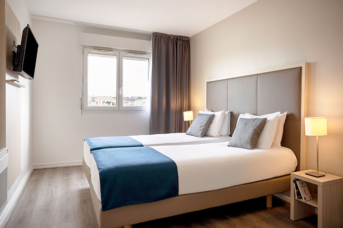 Chambre 2 lits simples - Séjours & Affaires Paris Vincennes Chambre 2 lits simples